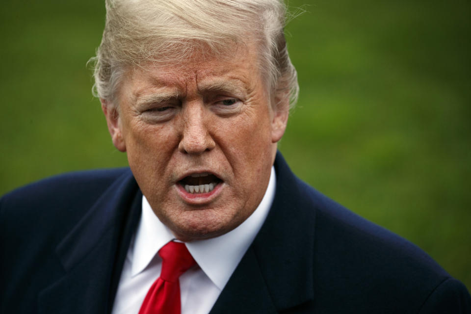 FILE- In this Nov. 26, 2018, file photo President Donald Trump speaks to members of the media before boarding Marine One on the South Lawn of the White House in Washington. According to a study in Monday, Feb. 11, 2019, Proceedings of the National Academy of Sciences, leaders are speaking far more simply and with more confidence than they did four score and seven years ago. Donald Trump's speech has accelerated that trend. The new study says Trump talks less analytically, and more confidently, than all past U.S. presidents. (AP Photo/Evan Vucci, File)