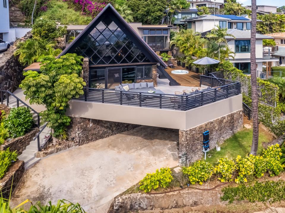 The exterior of the A-frame home.