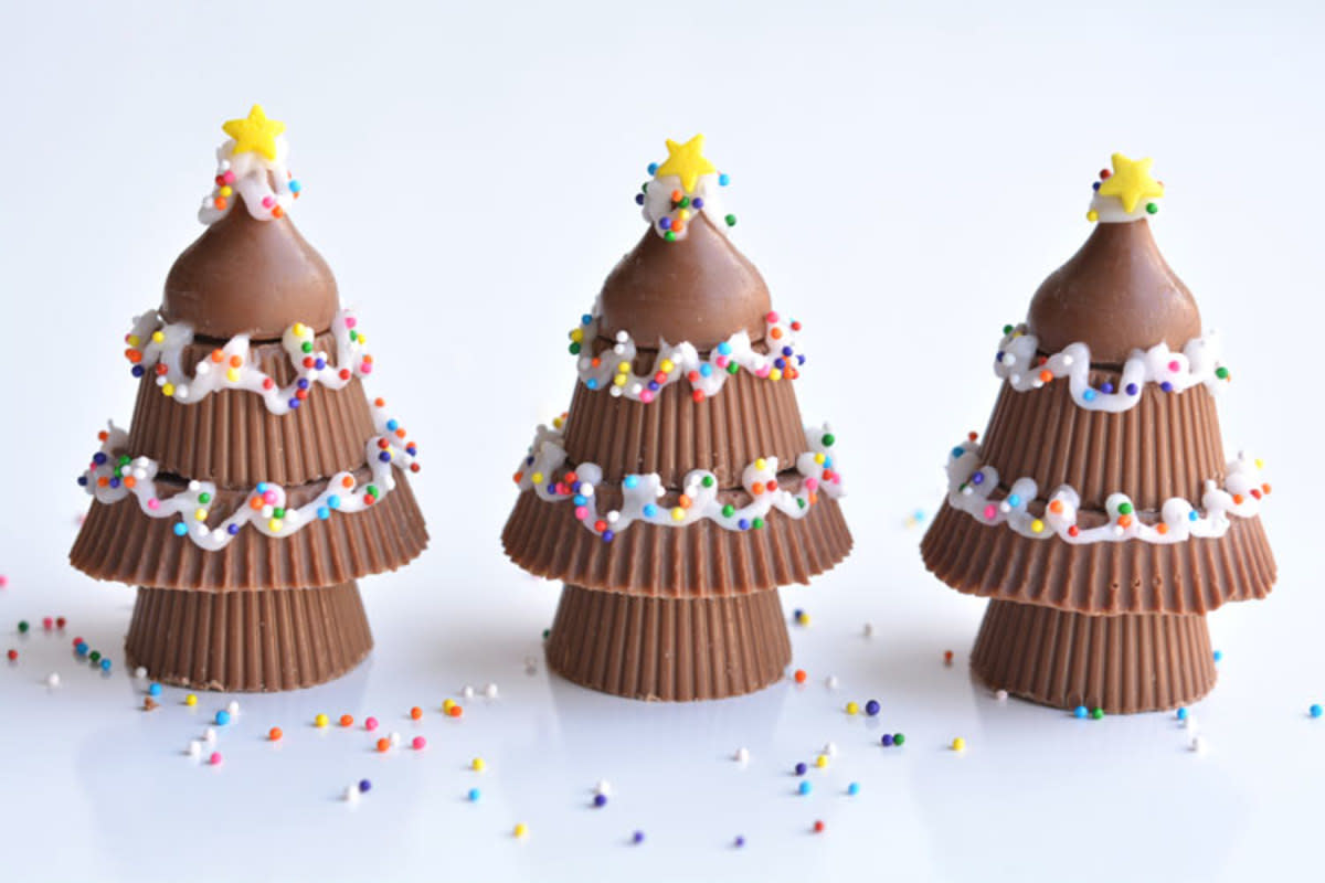 <p>One Little Project</p><p>Peanut butter cups, but better.</p><p><strong>Get the recipe: <a href="https://onelittleproject.com/peanut-butter-cup-christmas-trees/" rel="nofollow noopener" target="_blank" data-ylk="slk:Peanut Butter Cup Christmas Trees;elm:context_link;itc:0;sec:content-canvas" class="link rapid-noclick-resp">Peanut Butter Cup Christmas Trees</a></strong></p>