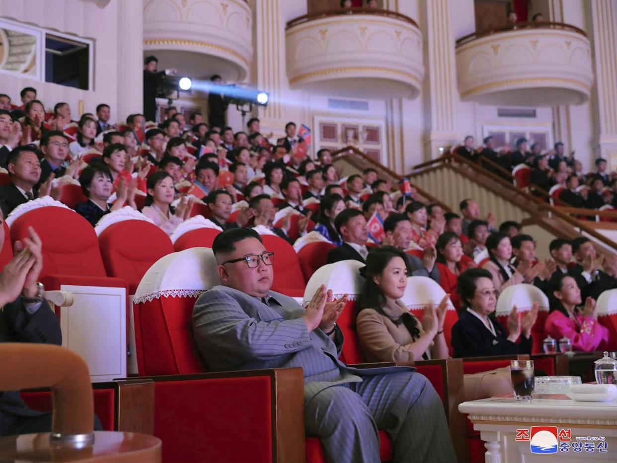 North Korean leader Kim Jong-un (centre) is shown sitting close to his aunt Kim Kyong-hui (second from right) on official state media pictures: AP