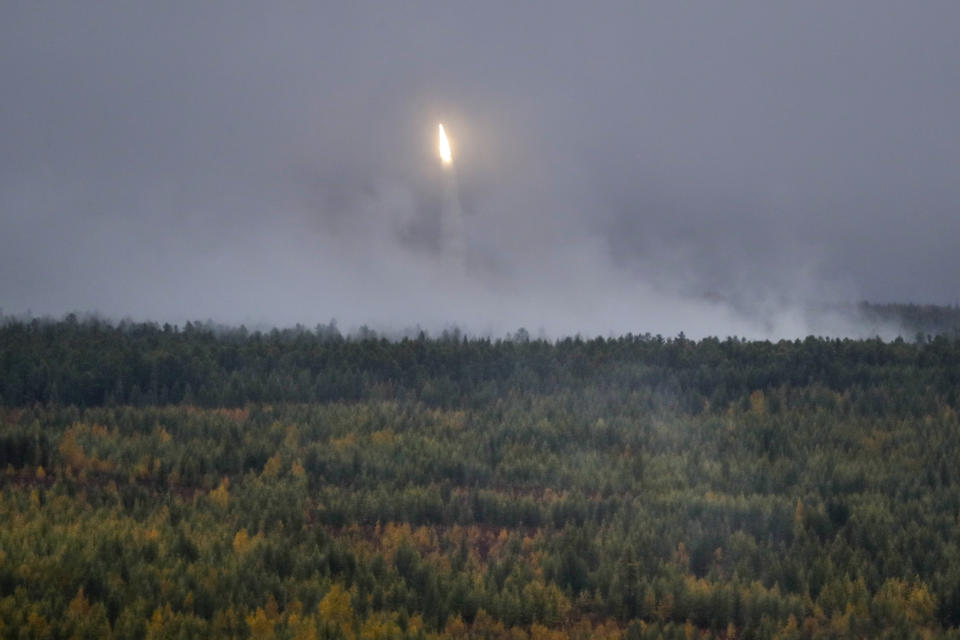 An air defense missile system is set off during a military exercises on training ground "Telemba", about 80 kilometers (50 miles ) north of the city of Chita during the military exercises Vostok 2018 in Eastern Siberia, Russia, Wednesday, Sept. 12, 2018. Hundreds of thousands Russian troops swept across Siberia on Tuesday in the nation's largest ever war games also joined by China — a powerful show of burgeoning military ties between Moscow and Beijing amid their tensions with the U.S. (AP Photo/Sergei Grits)