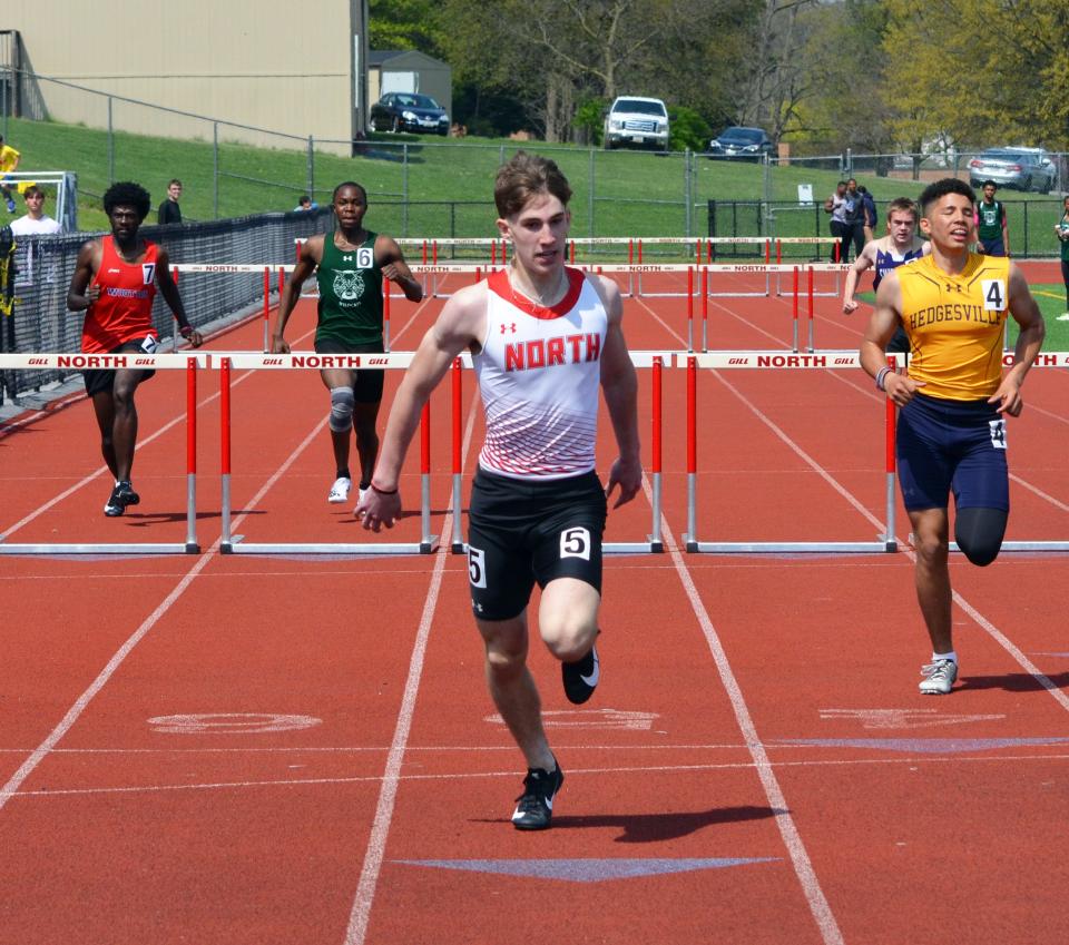 North Hagerstown's Ryder Johnston wins Heat 2 of the boys 300-meter hurdles and finishes third overall in a personal-record time of 43.54 seconds at the Chuck Zonis Track & Field Invitational at North.