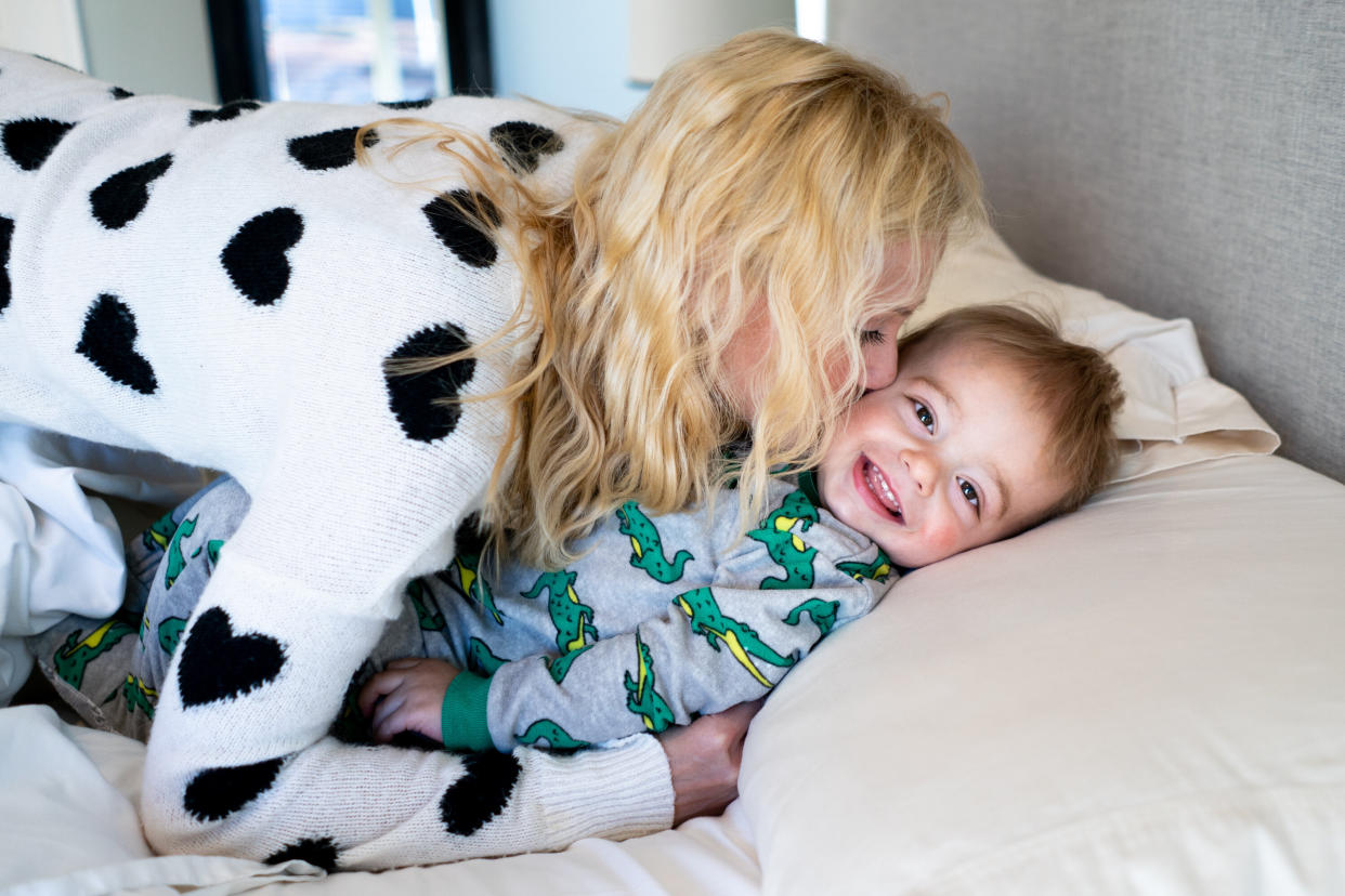 Amber Freed snuggles with her son, Maxwell Freed, 2, as they get ready to start the day at their home in Denver on May 11, 2019. (Photo: Autumn Parry for HuffPost)