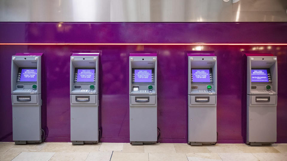 Row of free cash withdrawals ATM machines.