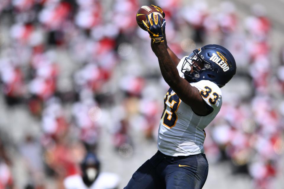 Sep 24, 2022; San Diego, California, USA; Toledo Rockets running back Peny Boone (33) makes a catch against the San Diego State Aztecs during the first half at Snapdragon Stadium. Mandatory Credit: Orlando Ramirez-USA TODAY Sports