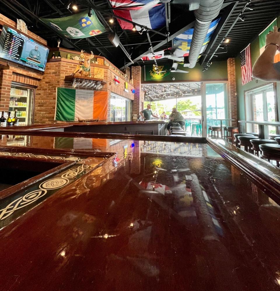 A large, winding bar works its way through the dining room at McGregor's Public House.