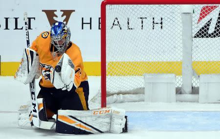 Jan 19, 2019; Nashville, TN, USA; Nashville Predators goaltender Juuse Saros (74) makes a save during the third period against the Florida Panthers at Bridgestone Arena. Mandatory Credit: Christopher Hanewinckel-USA TODAY Sports