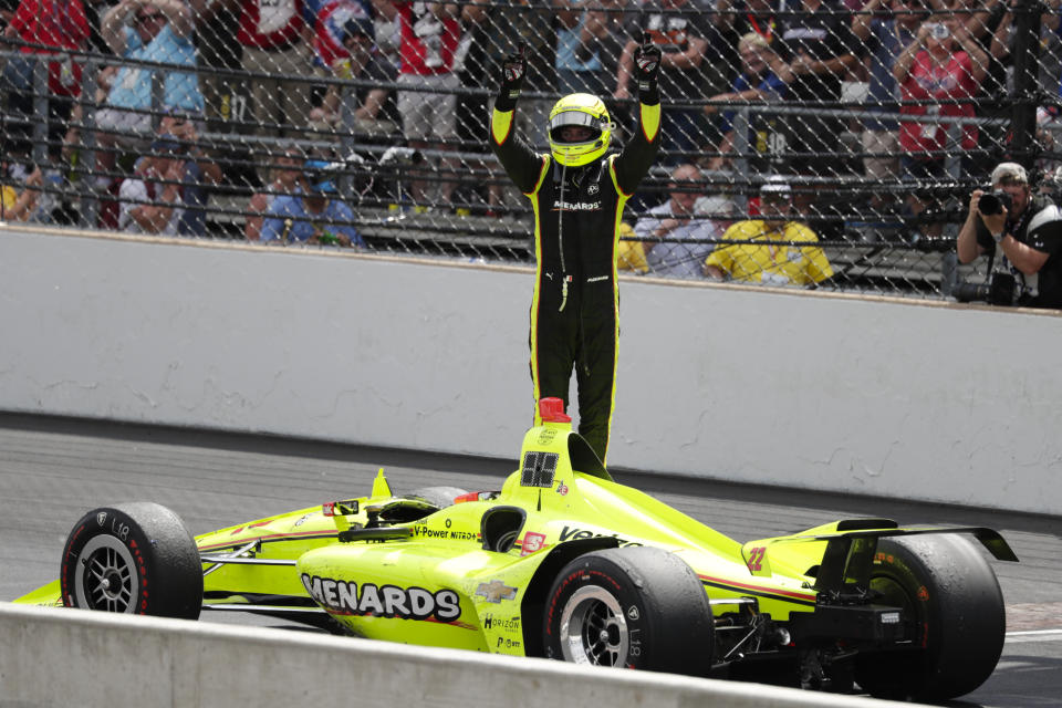 Simon Pagenaud, of France, celebrates after winning the Indianapolis 500 IndyCar auto race at Indianapolis Motor Speedway, Sunday, May 26, 2019, in Indianapolis. (AP Photo/Michael Conroy)