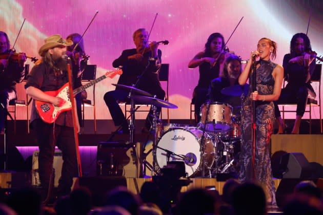Chris Stapleton and Dua Lipa performing at the 2024 ACM Awards. - Credit: Jason Kempin/Getty Images