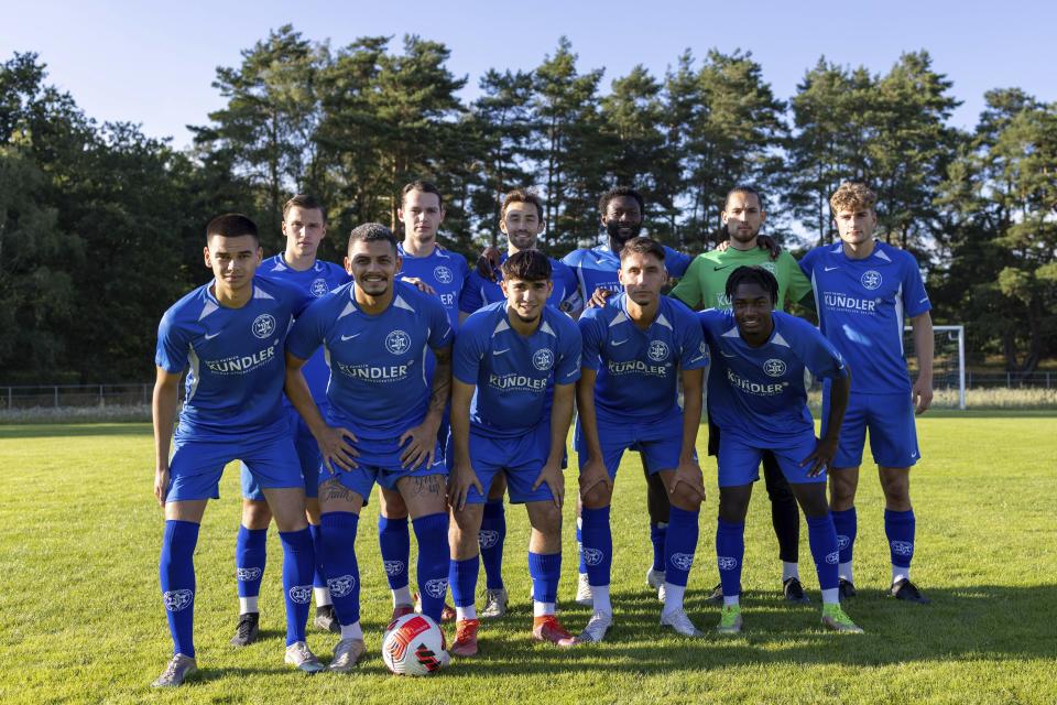 The Makkabi Berlin team pose for a photo before a practice match, in Berlin, Wednesday, July 26, 2023. When Makkabi Berlin takes the field on Sunday Aug. 13, 2023, the soccer club founded by Holocaust survivors will become the first Jewish team to play in the German Cup. (AP Photo/Ciaran Fahey)