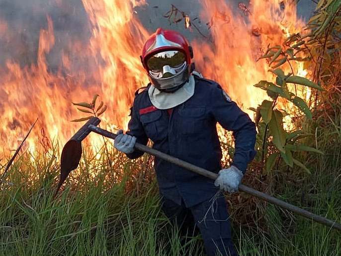 A firefighter battles against the fire in Rio Branco, in the Amazonian State of Acre: EPA