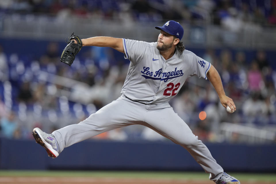 Los Angeles Dodgers' Clayton Kershaw delivers a pitch during the first inning of a baseball game against the Miami Marlins, Tuesday, Sept. 5, 2023, in Miami. (AP Photo/Wilfredo Lee)