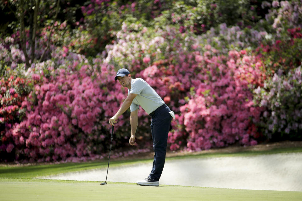 FILE - In this April 8, 2019, file photo, Rory McIlroy, of Northern Ireland, watches his putt on the 13th hole during a practice round for the Masters golf tournament in Augusta, Ga. Because of the coronavirus pandemic, the Masters is being held in November (Nov. 12-15) for the first time. (AP Photo/Charlie Riedel, File)