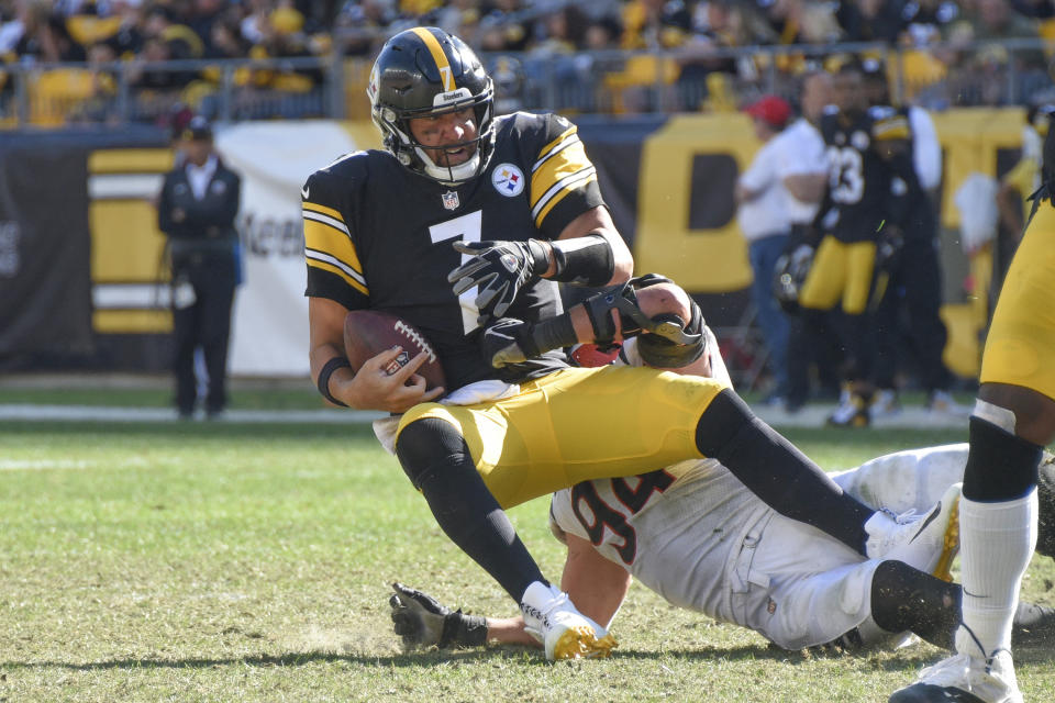 Pittsburgh Steelers quarterback Ben Roethlisberger (7) is sacked by Cincinnati Bengals defensive end Sam Hubbard (94) during the second half an NFL football game, Sunday, Sept. 26, 2021, in Pittsburgh. The Bengals won 24-10. (AP Photo/Don Wright)