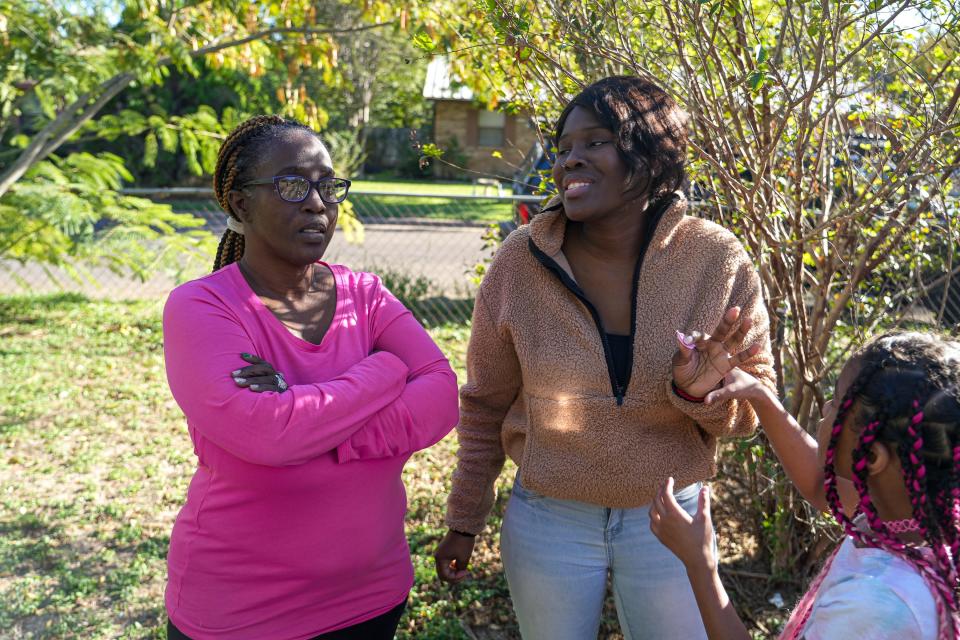 Tracey Piper, left, speaks to daughter Jamisha Cook, who has lupus. Piper helps take Cook to medical appointments.