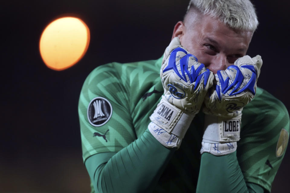 Goalkeeper Guillermo De Amores of Uruguay's Penarol celebrates his team's second goal against Brazil's Atletico Mineiro during a Copa Libertadores Group G soccer match at Campeon del Siglo Stadium in Montevideo, Uruguay, May 14, 2024. (AP Photo/Matilde Campodonico)