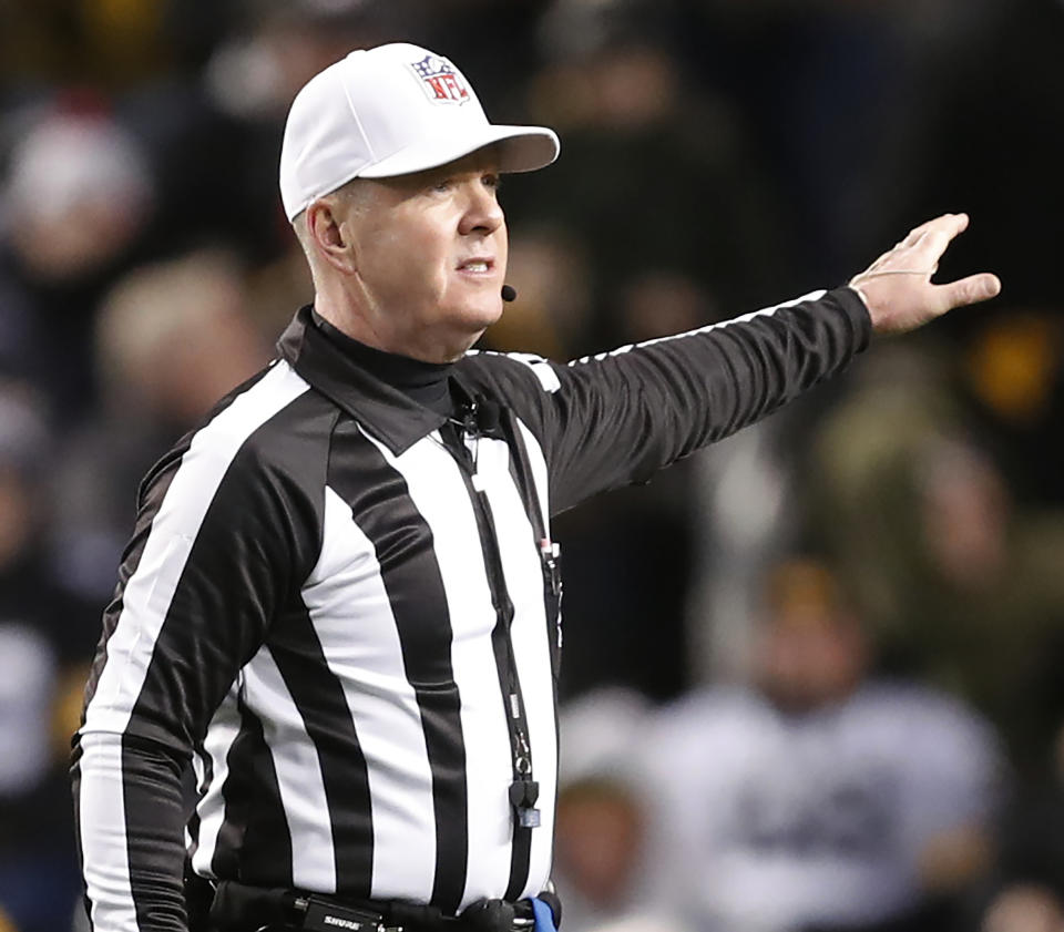 FILE - Referee John Parry makes a call during the second half of an NFL football game between the Pittsburgh Steelers and the New England Patriots in Pittsburgh, Dec. 16, 2018. Buffalo Bills coach Sean McDermott is getting help to address his red flag issues by adding former NFL official Parry to his staff, a person with knowledge of the hiring confirmed to The Associated Press, Monday, May 13, 2024. The person spoke to The AP on the condition of anonymity because the team has not announced the hiring. (AP Photo/Keith Srakocic, File)