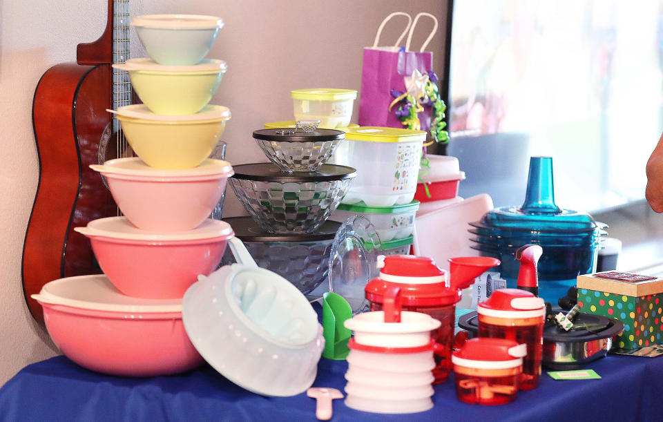 a stack of tupperware containers