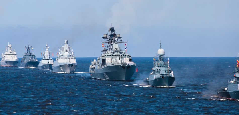 Russian Navy ships deployed at sea, in formation.