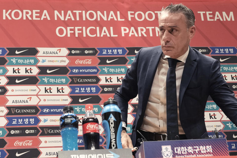 South Korean national soccer team head coach Paulo Bento leaves after a press conference to announce the South Korean squad for the Qatar 2022 World Cup in Seoul, South Korea, Saturday, Nov. 12, 2022. (AP Photo/Ahn Young-joon)