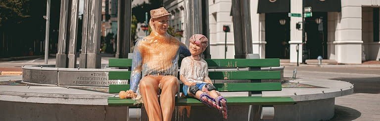 For the final sculpture of the series, the artists sculpted a chipper grandfather smiling alongside his young granddaughter.