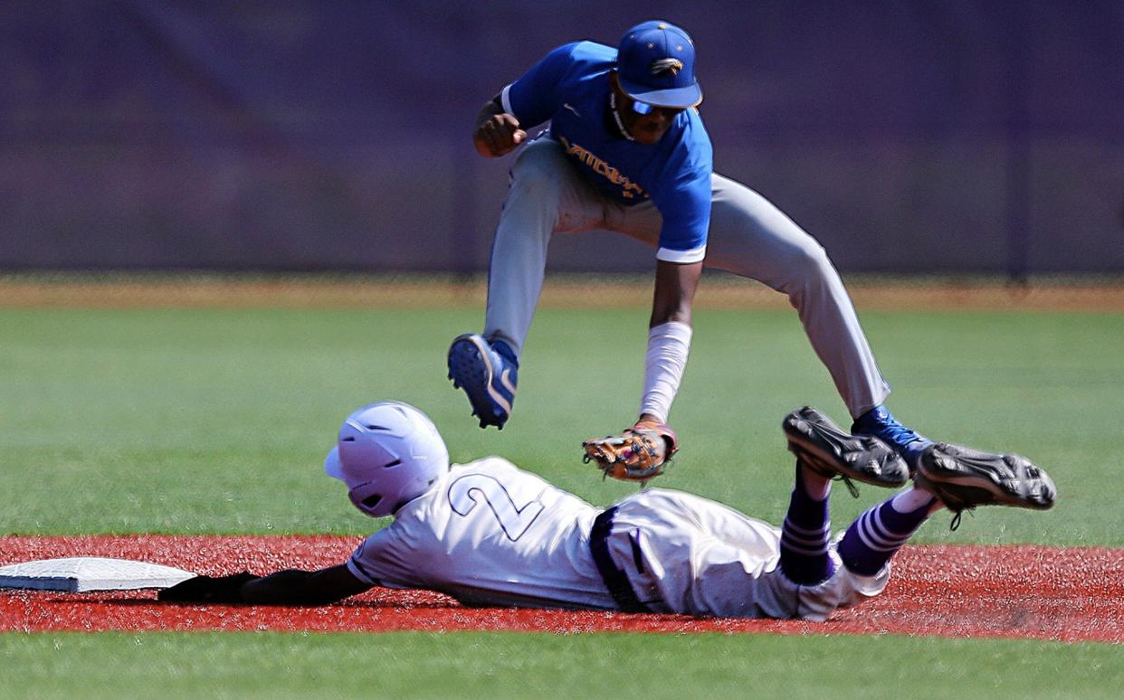 North Brunswick shortstop Yomar Carreras applies the tag as Old Bridge's Thomas Papeo slides in second during the Central Group 4 baseball final on June 2, 2023