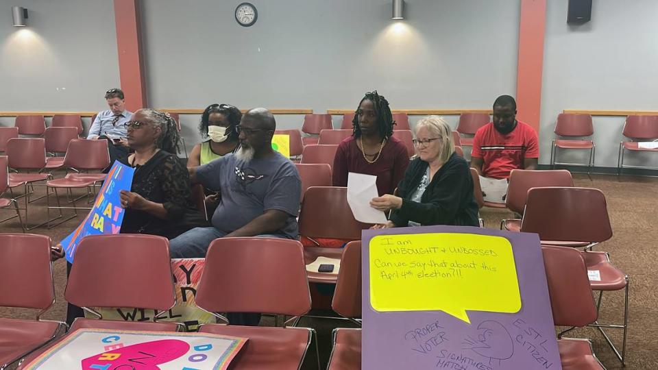 Mayoral candidate Marie Franklin and her supporters attend the East St. Louis Board of Election Commissioners meeting Thursday at City Hall to ask the commissioners to postpone certifying the April 4 election results until allegations of voter fraud can be investigated. The board, through its attorney, said it had no power to investigate. Commissioners voted Thursday to accept the election results.