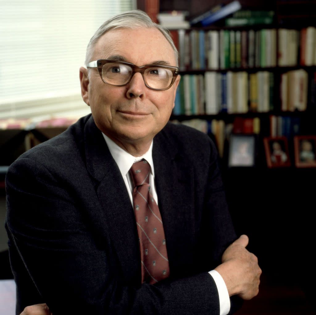 American billionaire investor Charles Munger poses for a portrait with his arms folded in Los Angeles, California, March 9, 1988.