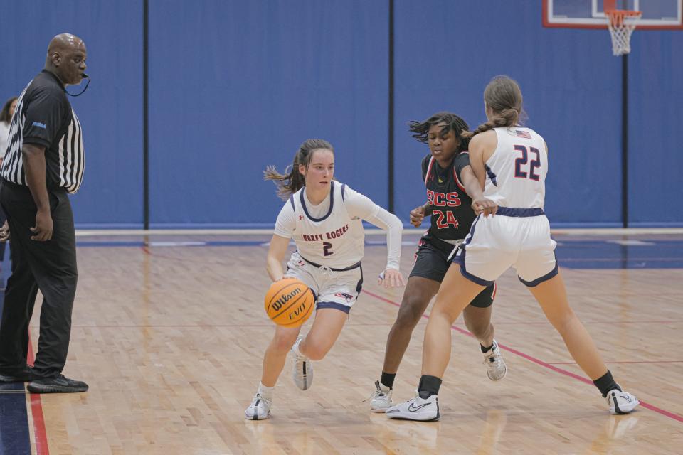 The ECS girls basketball team traveled to Naples to play Aubrey Rogers on Monday, Dec. 11, 2023. The Patriots' Angelina Insana drives with the ball.