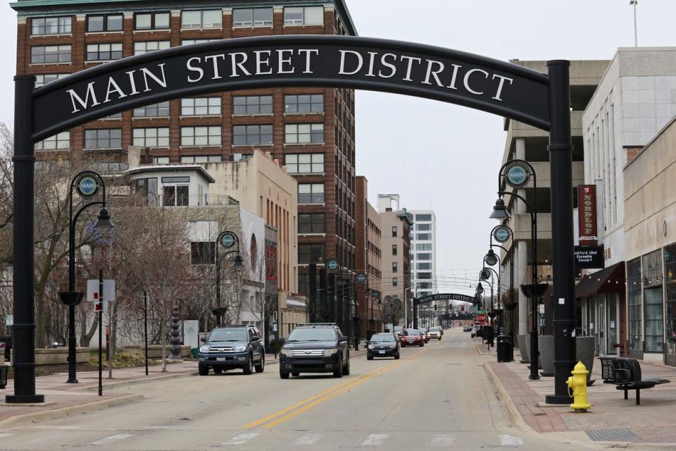 Vehicles travel north on Main Street on Wednesday, April 20, 2022, in downtown Rockford.