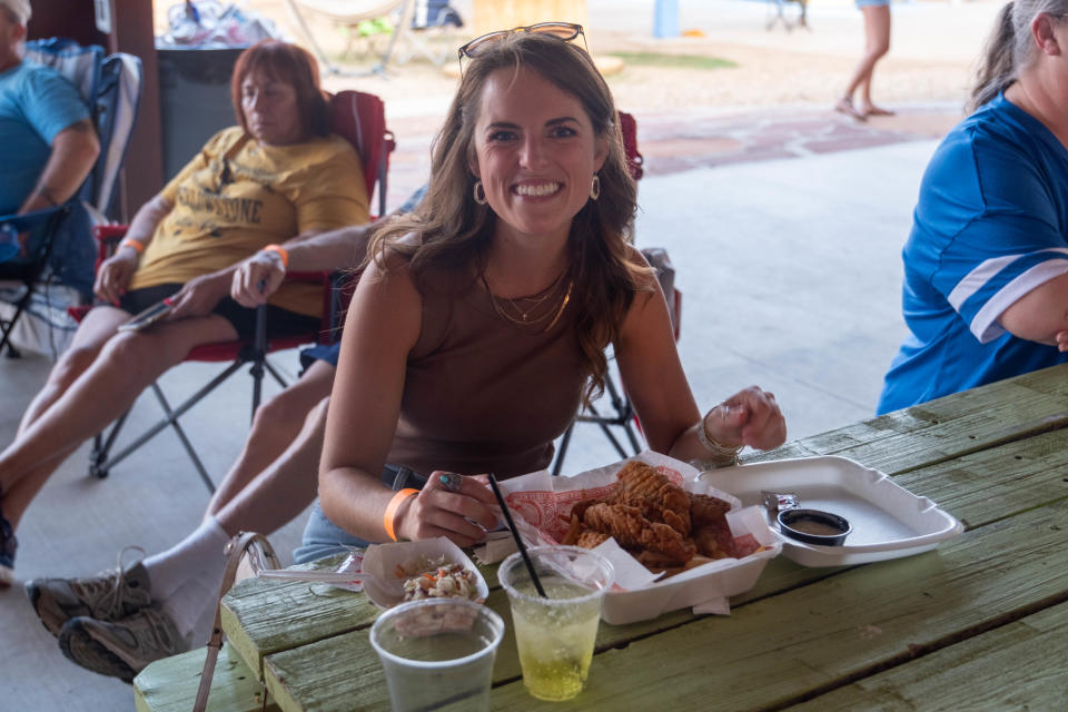 Valerie Dee chickens out and goes with the chicken fingers Saturday evening at the 1st annual Calf Fry Festival at the Starlight Ranch Event Center in Amarillo.