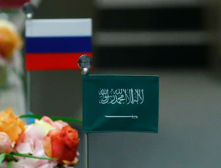 The national flags of Russia and Saudi Arabia are seen during a meeting of the Organization of the Petroleum Exporting Countries (OPEC) and non-OPEC producing countries in Vienna, Austria, May 25, 2017. REUTERS/Leonhard Foeger