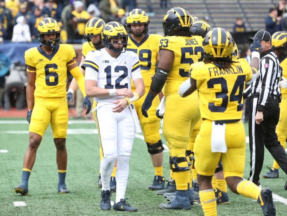 Cade McNamara runs the offense during the Michigan spring game Saturday, April 2, 2022, at Michigan Stadium.