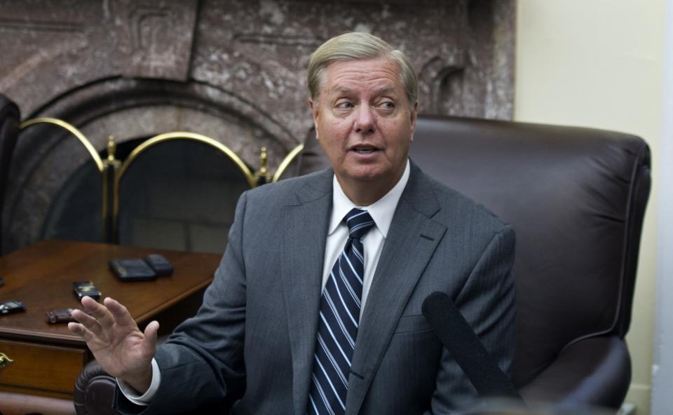 Sen. Lindsey Graham, R-S.C., speaks with reporters on Capitol Hill on Nov. 15. (Photo: Cliff Owen/AP)