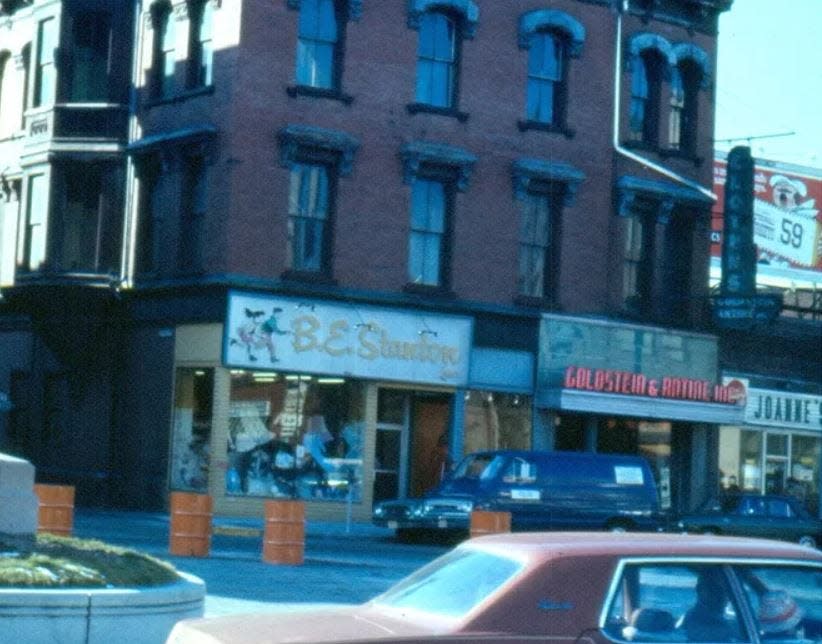 This historic photo shows the exterior of the Star Theater/Leonard Block building in Taunton, which also housed the Goldstein & Antine and B.E. Stanton clothing stores.