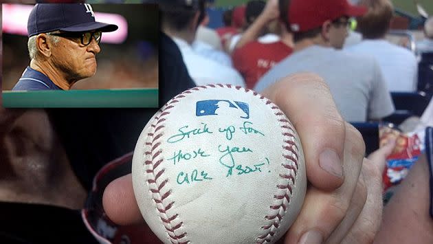 Joe Maddon replies to Washington heckler with personalized ball smeared  with pine tar