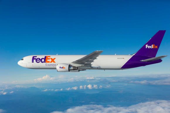 A FedEx plane in flight.