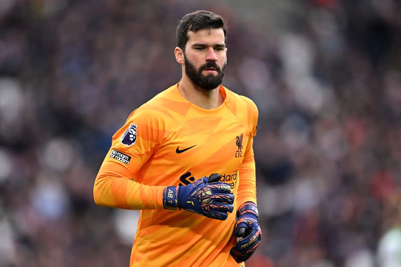 Alisson Becker has been linked with a summer move but remains 'very happy' at Liverpool.