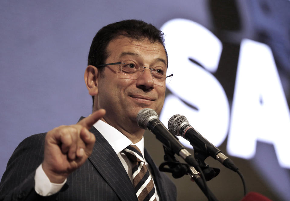 Ekrem Imamoglu, secular candidate from Turkey's main opposition Republican People's Party, addresses a meeting in Istanbul, Friday, June 21, 2019, ahead of June 23 re-run of Istanbul elections. Millions of voters in Istanbul go back to the polls for a controversial mayoral election re-run Sunday, as President Recep Tayyip Erdogan's party tries to wrestle back control of Turkey's largest city. The banner reads: " Protect your votes." (AP Photo/Burhan Ozbilici)