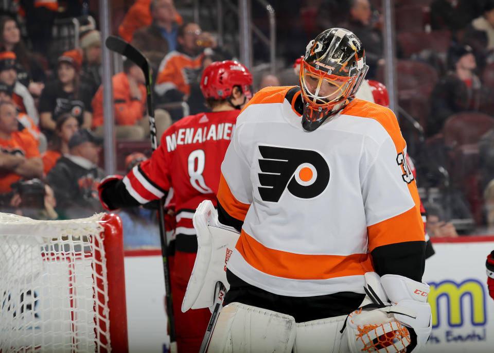 PHILADELPHIA, PENNSYLVANIA - JANUARY 03:   Michal Neuvirth #30 of the Philadelphia Flyers reacts after giving up a goal to Teuvo Teravainen #86 of the Carolina Hurricanes in the third period at Wells Fargo Center on January 03, 2019 in Philadelphia, Pennsylvania. The Carolina Hurricanes defeated the Philadelphia Flyers 5-3. (Photo by Elsa/Getty Images)