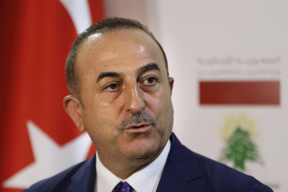 Turkish Foreign Minister Mevlut Cavusoglu, speaks during a joint press conference with his Lebanese counterpart, Gibran Bassi, at the Lebanese foreign ministry, in Beirut, Lebanon, Friday, Aug. 23, 2019. (AP Photo/Bilal Hussein)