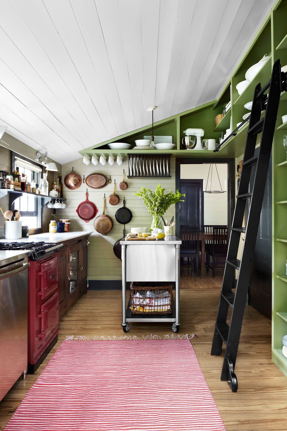 farmhouse kitchen with green shelving