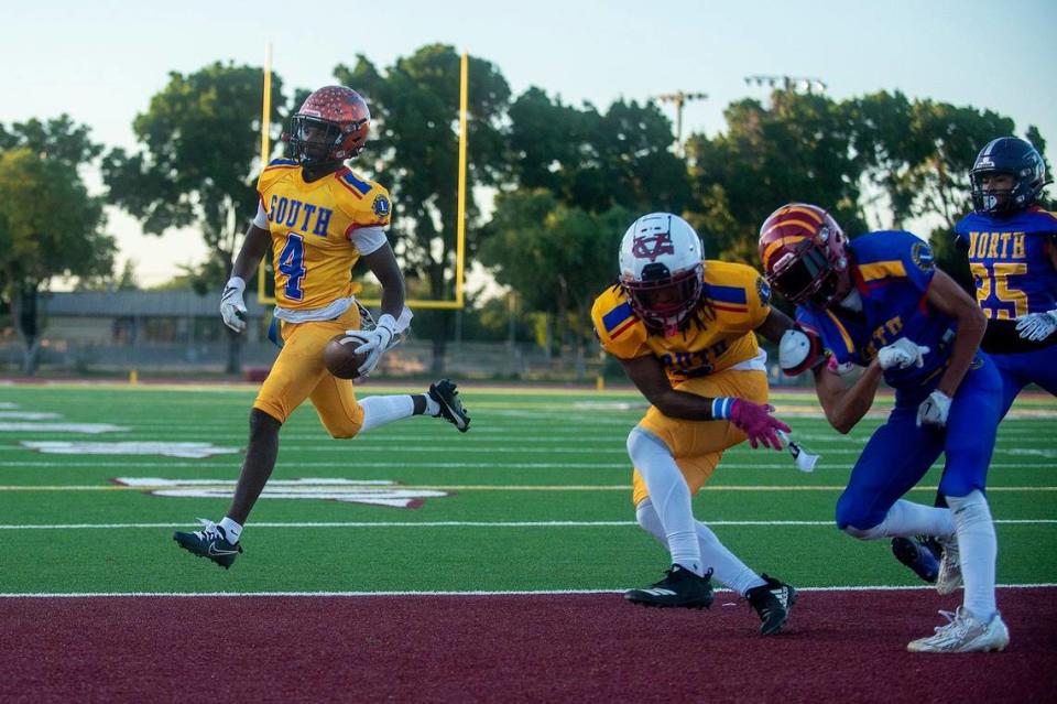 South All-Star running back Chase Smith (4) representing Merced, scampers across the goal line for a touchdown during the Merced County All-Star Football Game at Golden Valley High School in Merced, Calif., on Saturday, June 15, 2024. The South All-Stars beat the North All-Stars 33-20.