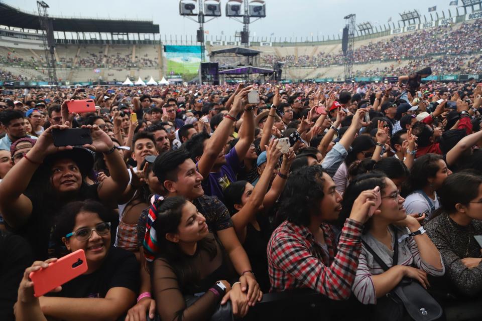 Fans enjoy the atmosphere during the second day of Vive Latino 2020 at Foro Sol on March 15 in Mexico City.