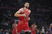 Chicago Bulls guard Zach LaVine smiles after making a 3-point basket during the first half of an NBA basketball game against the Los Angeles Clippers Monday, March 27, 2023, in Los Angeles. (AP Photo/Marcio Jose Sanchez)