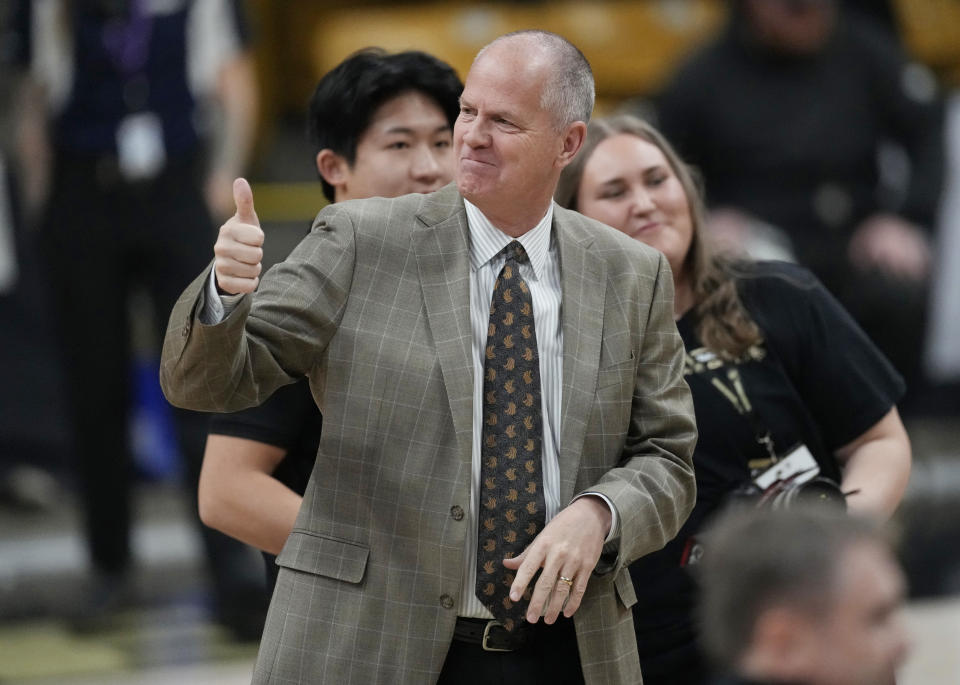 FILE - Colorado head coach Tad Boyle gestures to the crowd before the first half of an NCAA college basketball game against Utah, Saturday, March 4, 2023, in Boulder, Colo. (AP Photo/David Zalubowski, File)