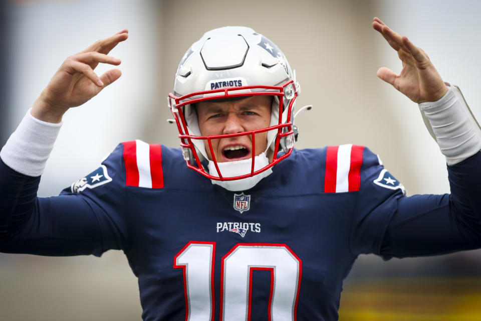 FOXBOROUGH, MASSACHUSETTS - NOVEMBER 28: Mac Jones #10 of the New England Patriots looks on before a game against the Tennessee Titans at Gillette Stadium on November 28, 2021 in Foxborough, Massachusetts. (Photo by Adam Glanzman/Getty Images)