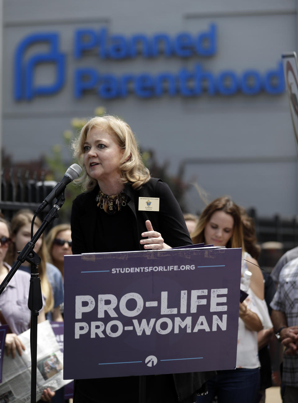 Karen Nolkemper, executive director of the Archdiocese of St. Louis Respect Life Apostolate, speaks during an anti-abortion rally outside the Planned Parenthood clinic Tuesday, June 4, 2019, in St. Louis. A judge is considering whether the clinic, Missouri's only abortion provider, can remain open. (AP Photo/Jeff Roberson)