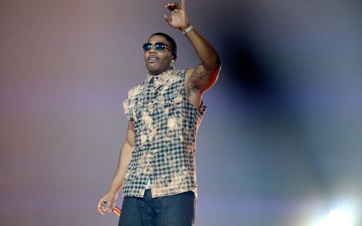 Rapper Nelly performs onstage at Honda Center on September 7, 2017 in Anaheim, California - 2017 Scott Dudelson
