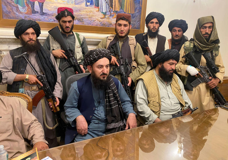 Taliban fighters take control of Afghan presidential palace after the Afghan President Ashraf Ghani fled the country, in Kabul, Afghanistan. Source: AP